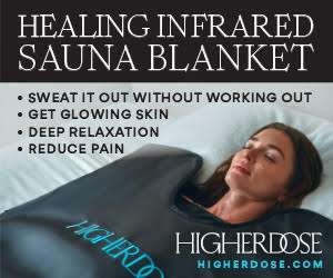 A woman wrapped in an infrared sauna blanket.